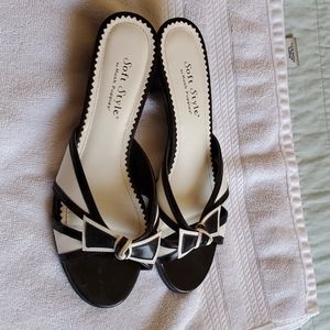 Black and white, used, heeled sandals.